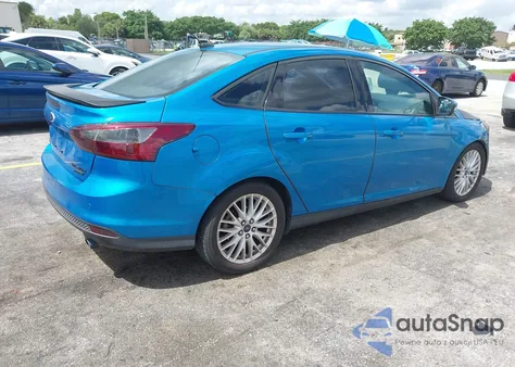 2014 Ford Focus Titanium z USA, uszkodzony, nr VIN 1FADP3J27EL204904
